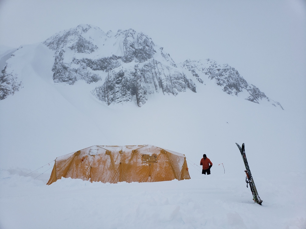 a backcountry touring winter camping setup in the chugach mountains of Alaska