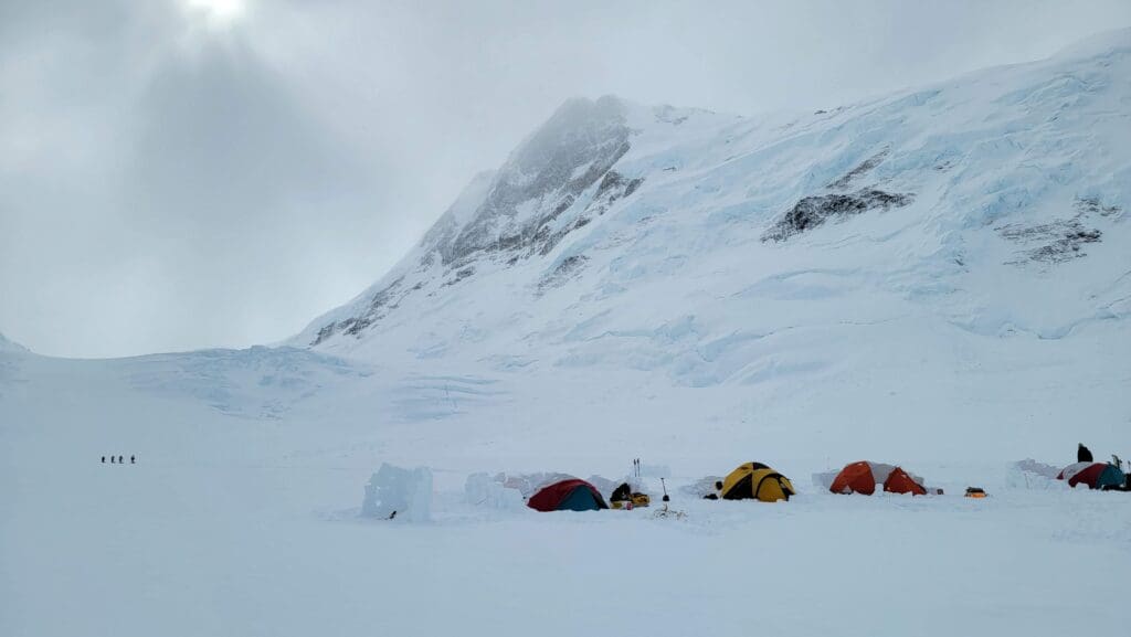 a group of backcountry skiers leaves camp 1 on the king trench route on mount logan in kluane national park