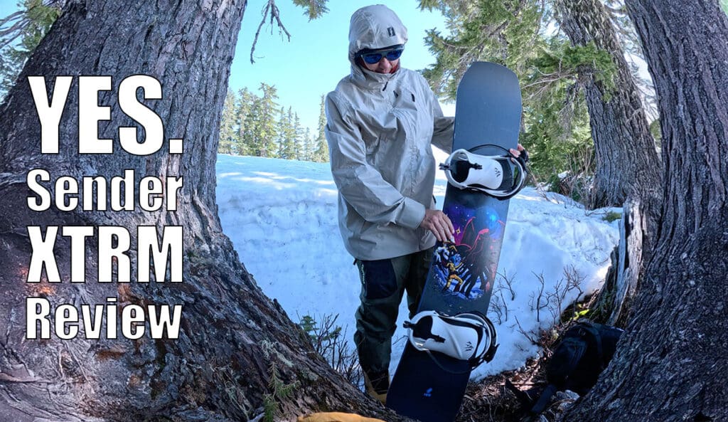 Feature image for the yes sender xtrm snowboard review with a snowboarder in the forest discussing the board.