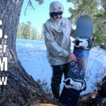Feature image for the yes sender xtrm snowboard review with a snowboarder in the forest discussing the board.