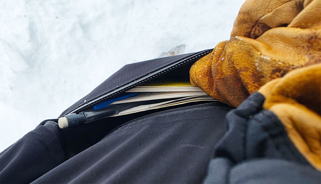 looking inside the side pocket of the Jones MTN Surf recycled snowboard pants