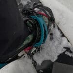 a close up shot of a snowboard boot entering the bindings using the FASE system