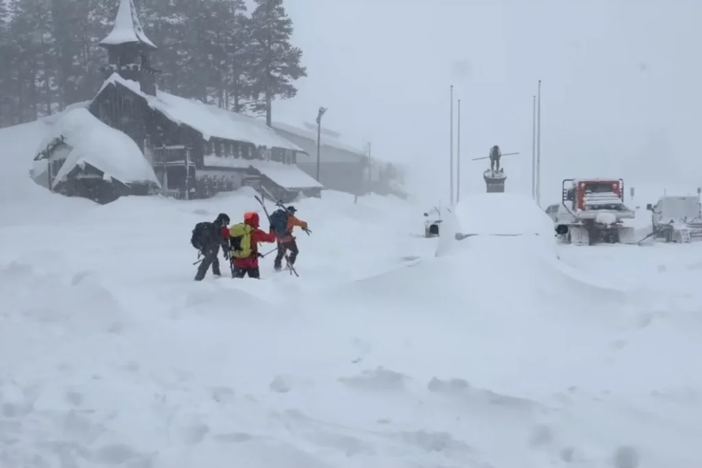 a team of rescuers departs from soda springs california to search for avalanche victims