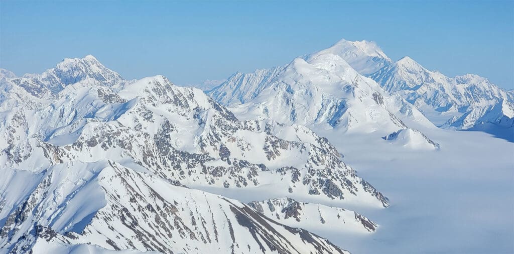 a view of the mountains in kluane national park in the spring
