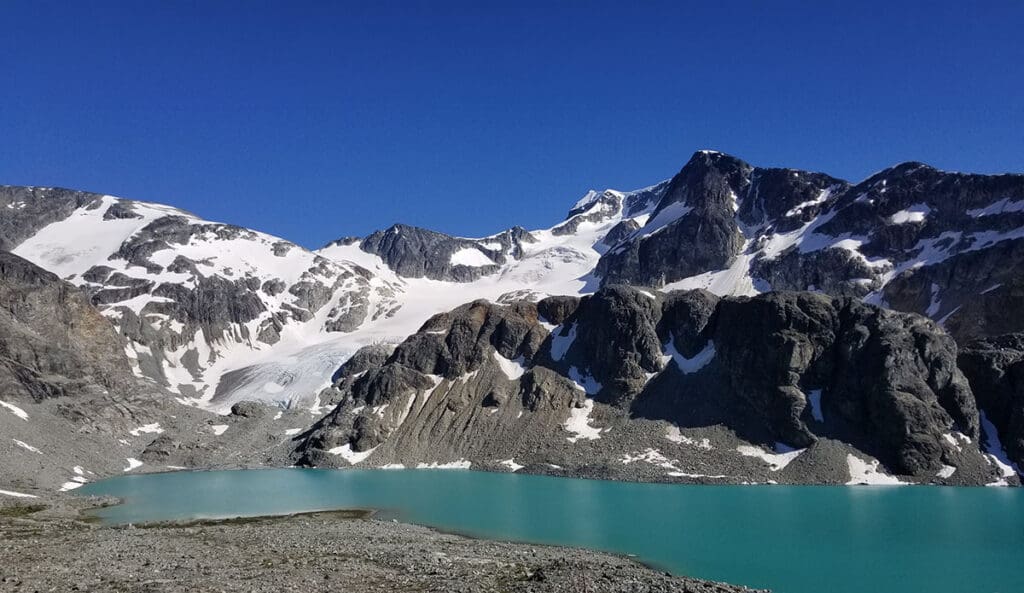 a view of wedgemount lake and glacier, looking southward in the summertime