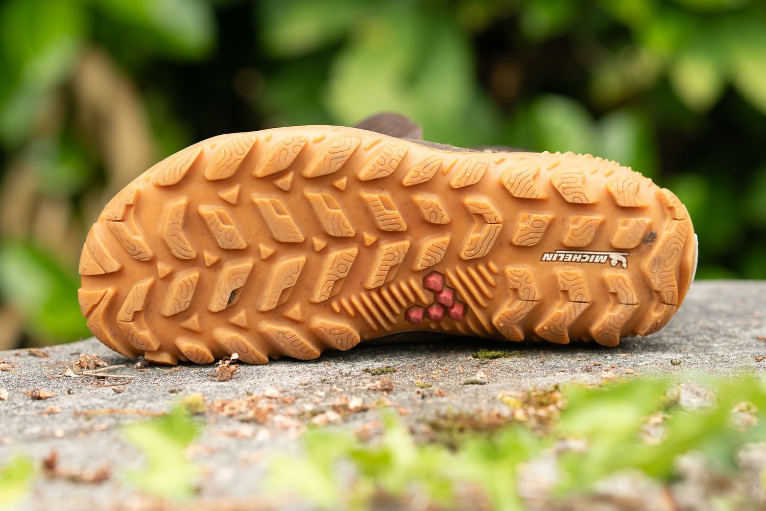 a close-up look at the bottom tread of the vivobarefoot tracker forest esc