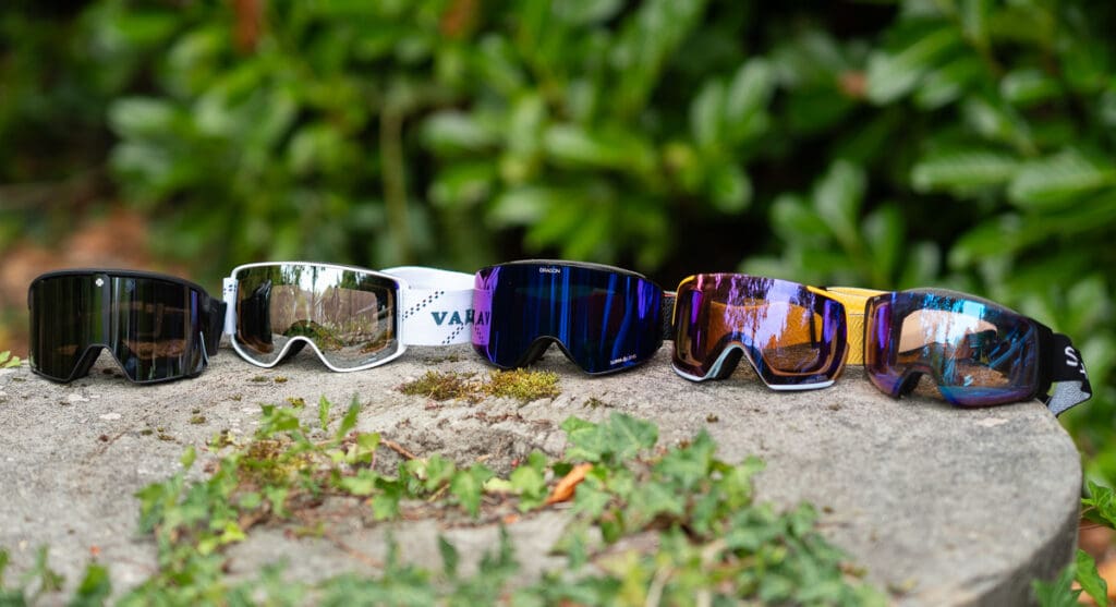 a lineup of snow goggles side by side for a review display
